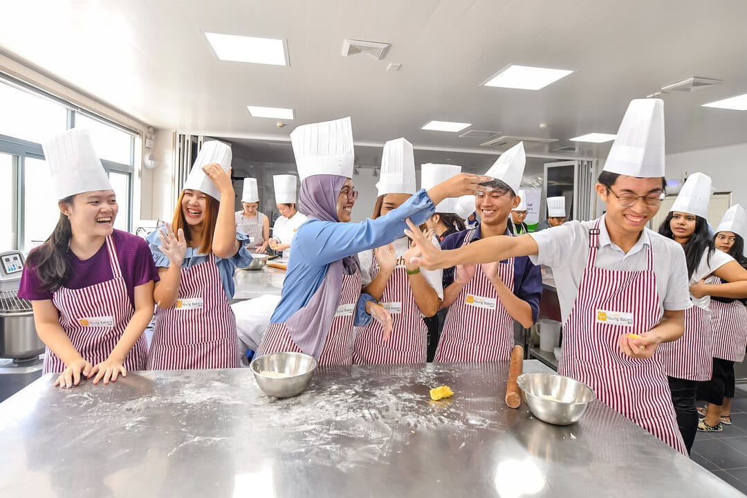 Participants bond over a team-building activity led by Shanghai Young Bakers, an organisation under Chi Heng Foundation that provides free French bakery training to marginalised Chinese youth, empowering them to find employment after graduation
