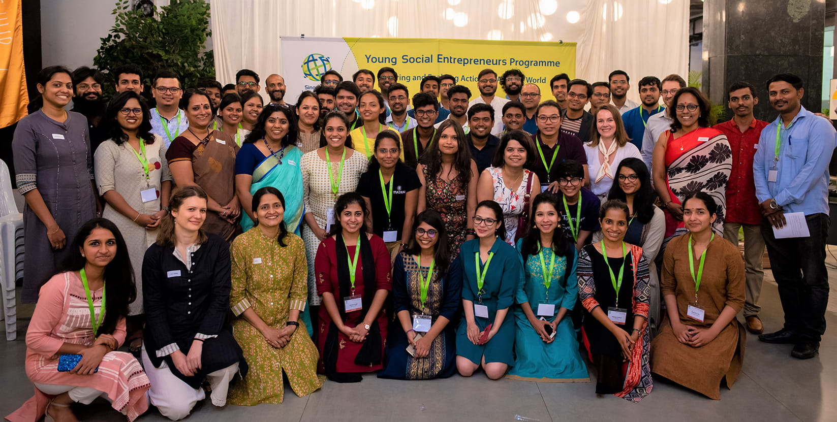 24 mentors from Singapore and India pose for a group photo with the YSEs during the Business Clinic session