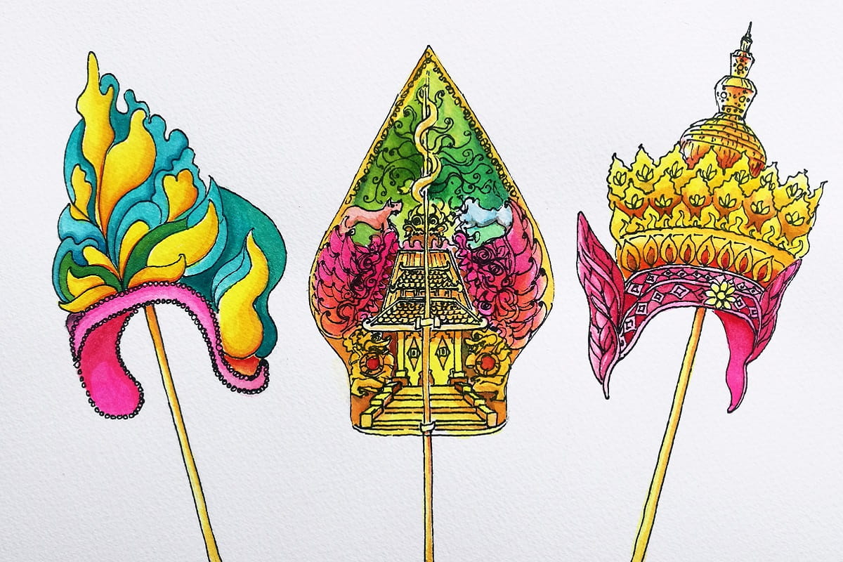 Three colourful ethnic headdresses cutouts on sticks